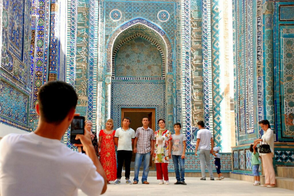 group of people in front of a cathedral